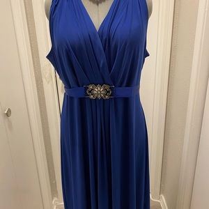 Blue dress 95% polyester & 5% Spandex with Ornaments design on Belt.